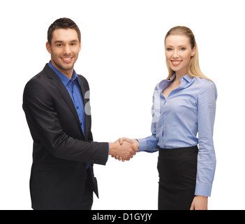 L uomo e la donna scuotendo le loro mani Foto Stock