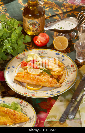 Pesce al forno con erbe aromatiche Foto Stock