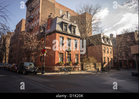 Con le sue storiche case in corrispondenza della zona di spigolo di Barrow e vie di commercio nel West Village quartiere di New York Foto Stock