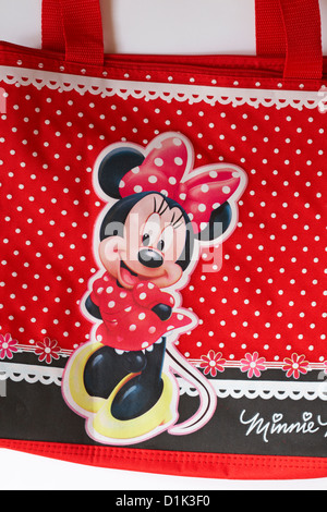 Dettaglio di Minnie Mouse sulla colorata di rosso polka dot shopping bag Foto Stock