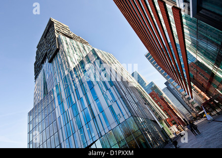 I Paesi Bassi, Amsterdam, quartiere degli affari Zuidas chiamato. edificio di sinistra chiamato la Roccia. Foto Stock