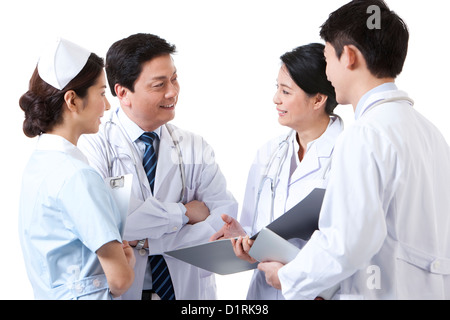 Felice professional team medico in discussione Foto Stock