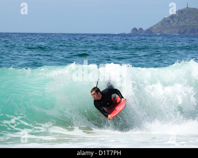 Corpo boarder a Sennen cornwall Foto Stock