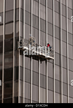 Uomini al lavoro su areale e piattaforma di lavoro - USA Foto Stock