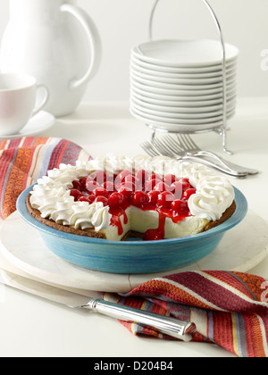 Cherry cheesecake in una impostazione di partito Foto Stock