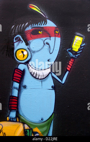Arte di strada da artista brasiliano Cranio, Pedley Street vicino a Brick Lane Londra, Inghilterra. Foto Stock