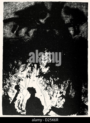 Gli uomini intorno al fuoco di notte Foto Stock