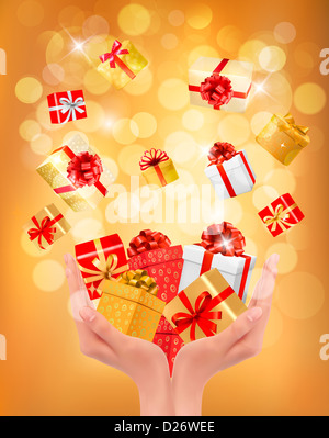 Holiday sfondo con mani confezioni regalo. Concetto di dare presenta. Illustrazione Vettoriale. Foto Stock