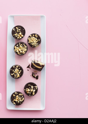 Piastra del burro di arachidi tazze Foto Stock