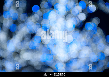 Blu bianco brilla e circoli bokeh abstract Foto Stock