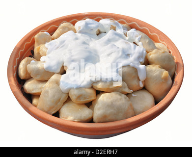 Tradizionale cibo ucraino - Gnocchi (varenik) con panna acida Foto Stock