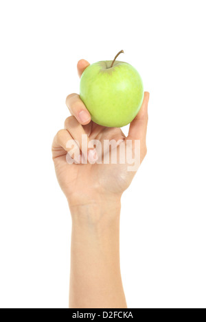 Donna bella mano che tiene un Apple in un bianco sfondo isolato Foto Stock