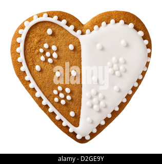 Natale gingerbread isolati su sfondo bianco, forma di cuore Foto Stock