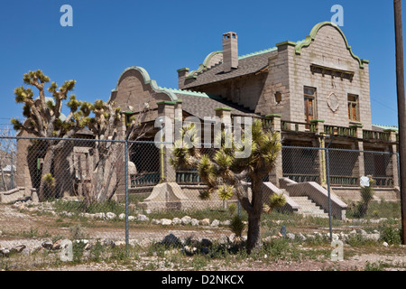 Deposito ferroviario nella città fantasma di riolite, Nevada. Foto Stock