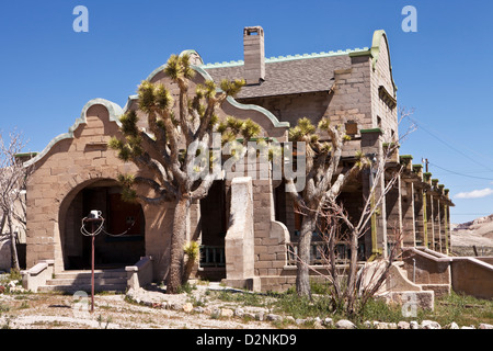 Deposito ferroviario nella città fantasma di riolite, Nevada. Foto Stock