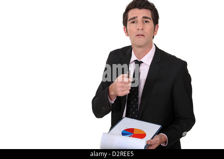 Executive con notebook in mano Foto Stock