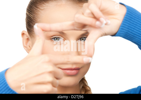 La donna la creazione di una cornice con le dita Foto Stock