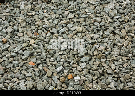 Pietra di granito trucioli decorativo o aggregati utilizzati su strade e marciapiedi Foto Stock