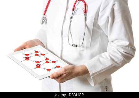 Immagine simbolica della medicina. Medico è utilizzando un computer tablet, Ipad. Molecole. Foto Stock