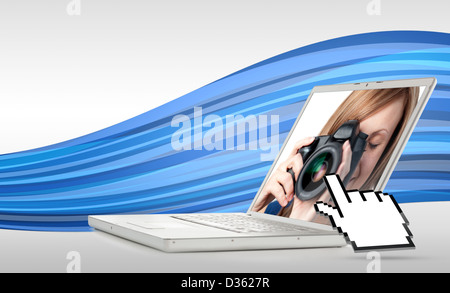 Icona della mano rivolto ad aprire il computer portatile che mostra la donna prendendo foto Foto Stock