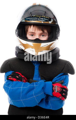 Bambino Motorsport indossare abbigliamento protettivo Foto Stock