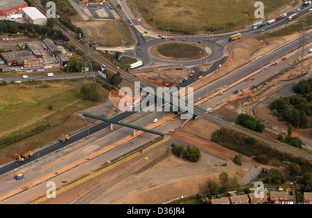 M6 autostrada a pedaggio in costruzione a Bridgtown UK. Vista aerea strade costruzione autostrade Gran Bretagna strada a pedaggio britannico svincolo infrastrutture autostrade Foto Stock