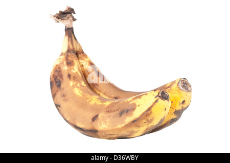 Banane stramature isolati su sfondo bianco Foto Stock