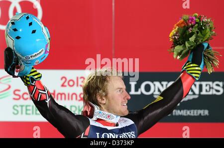 Schladming Austria, 11 febbraio 2013. Ted Ligety di noi reagisce durante la seconda esecuzione di uomini super-combinata in discesa a sci alpino ai Campionati Mondiali di Schladming Austria, 11 febbraio 2013. Foto: Karl-Josef Hildenbrand/DPA. Dpa di credito/Alamy Live News Foto Stock