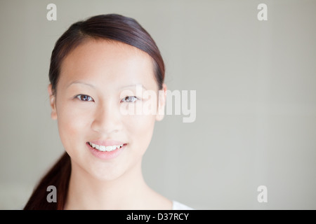 Close up di donna faccia sorridente Foto Stock