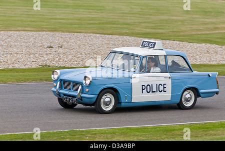 1964 Triumph Herald berlina 1200 in Monmouth livrea della polizia al 2012 Goodwood, Sussex, Regno Unito. Foto Stock