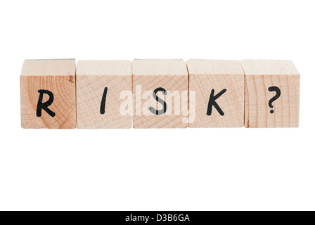 Il rischio con punto interrogativo scritto con blocchi di legno. Foto Stock