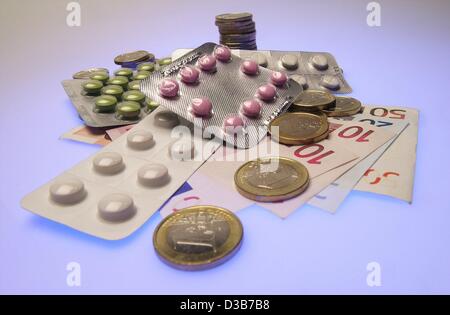 (Dpa) - una simbolica la foto mostra una varietà di pillole e denaro contante in euro, raffigurato in Amburgo, 4 dicembre 2002. Foto Stock