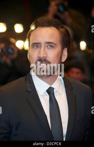 Attore Nicolas Cage arriva alla premiere di 'L'Croods' durante la 63a edizione annuale Festival Internazionale del Cinema di Berlino aka Berlinale a Berlinalepalast a Berlino, Germania, il 15 febbraio 2013. Foto: Hubert Boesl Foto Stock