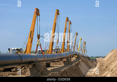 Schulzendorf, Germania, pagina albero sollevatore caterpillar di Opal gas pipeline Foto Stock