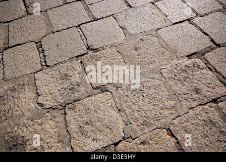 Vecchia strada pavimentata con ciottoli Foto Stock