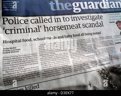 Le indagini della polizia in carne equina scandalo titoli di giornale sul lato anteriore della pagina del quotidiano Guardian 09.02.13 London REGNO UNITO Foto Stock