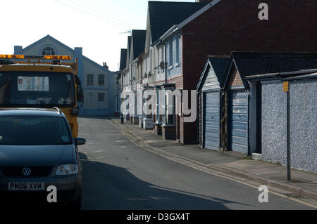 Aberystwyth, Wales, Regno Unito. Il 19 febbraio 2013. Sito proposto per il Mill Street lo sviluppo in Aberystwyth in cui i piani sono in atto per portare il nuovo commercio e occupazione alla città attraverso i nuovi negozi tra cui rapporti non confermati di Marks & Spencer e Tesco. La riconversione non è senza i suoi problemi come case, negozi, la città principale del parco auto e la vecchia Drill Hall dovranno essere demoliti per fare spazio a sufficienza, con alcuni locatari che rifiuta di lasciare quasi 2 anni dopo i piani iniziali sono state presentate. Credito: Barry Watkins / Alamy Live News Foto Stock