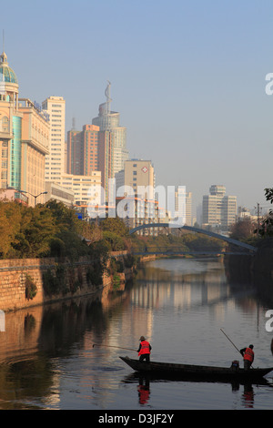 Cina Yunnan, Kunming, skyline, Fiume Panlong, battellieri, Foto Stock