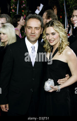 (Dpa) - British attrice Kate Winslet (R) assiste insieme con il marito British film del regista Sam Mendes La sessantaduesima Annuale di Golden Globe Awards a Beverly Hills, Stati Uniti d'America, 16 gennaio 2005. Foto Stock