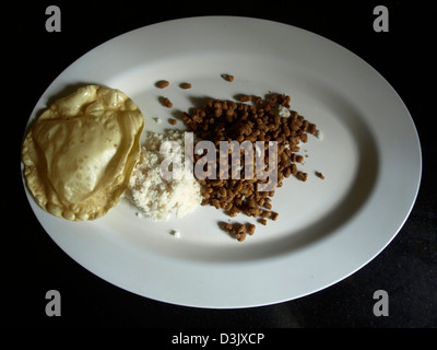 Puttu è un Kerala - sud indiane e dello Sri Lanka colazione piatto Foto Stock