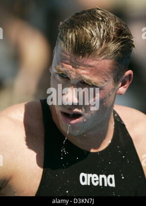 (Dpa) - l'immagine mostra nuotatore tedesco Thomas Rupprath dopo la gara preliminare degli uomini 100 metro butterly concorrenza a dei Campionati del Mondo di nuoto a Montreal, Canada, Venerdì, 29 luglio 2005. Con 53,03 secondi, Rupprath qualificato per le semifinali tra i 16 migliori atleti. Foto: Bernd Thissen Foto Stock