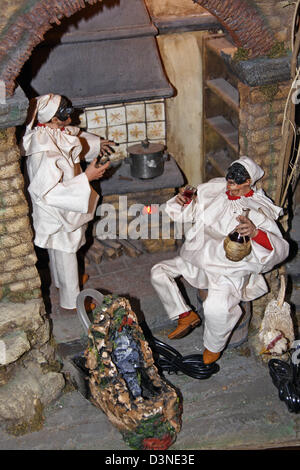 La mostra fotografica "Pulcinella', un presepio figura da Napoli, Italia, 10 dicembre 2005. Oltre ai tradizionali motivi cristiana, il presepe visualizza la vita quotidiana a Napoli. A Napoli si ha una più alta classifica rispetto all'albero di Natale, che non era stato introdotto fino a dopo la seconda guerra mondiale. Foto: Lars Halbauer Foto Stock