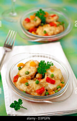 Rana pescatrice con verdure e curry. Ricetta disponibile. Foto Stock