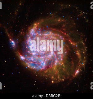 L'Osservatorio radiografico di Chandra cattura un'immagine straordinaria di una galassia a spirale, M101, situata a 22 milioni di anni luce dalla Terra, che celebra l'anno internazionale dell'astronomia. Foto Stock