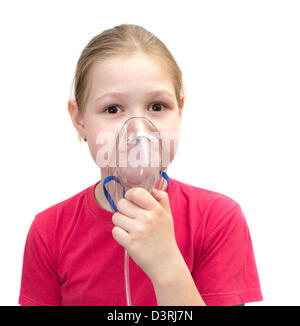 La ragazza con una maschera per inalazioni Foto Stock