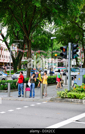 Orchard Road,Central Area dello Shopping,ristoranti,hotels,appartamenti,case della città,duplici,alberate vie ombreggiate,Singapore Foto Stock