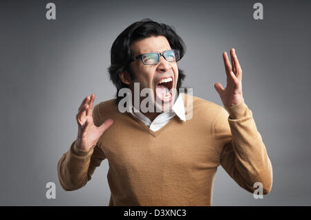 Imprenditore urlare Foto Stock