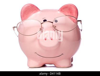 Salvadanaio di indossare gli occhiali da lettura studio ritaglio Foto Stock