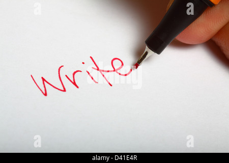 La parola scrivere in inchiostro rosso Foto Stock