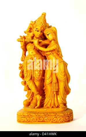 Statuetta Krishna e Radha su sfondo bianco Foto Stock